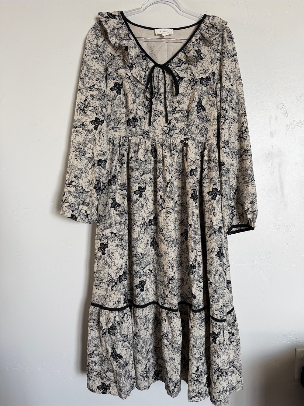 Cream Floral Maxi Dress with Black Trim and Tie-Neck